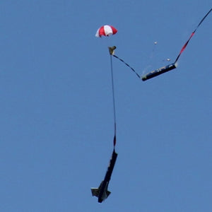 a person is flying a kite in the air 
