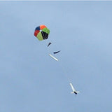 a couple of kites are flying in the sky 